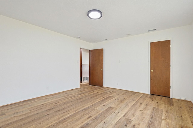 empty room featuring light hardwood / wood-style flooring