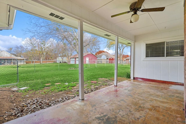 exterior space featuring ceiling fan