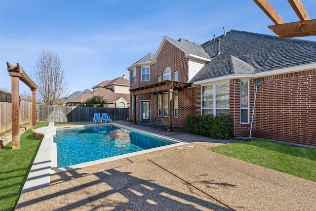 view of pool with a patio area and a pergola