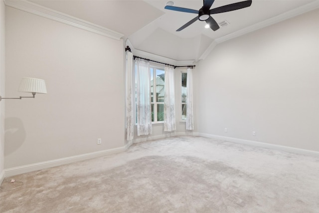 carpeted spare room with crown molding and ceiling fan