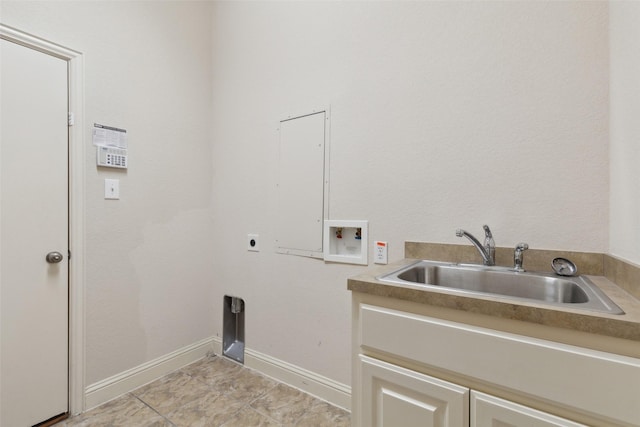 clothes washing area with washer hookup, sink, cabinets, and hookup for an electric dryer