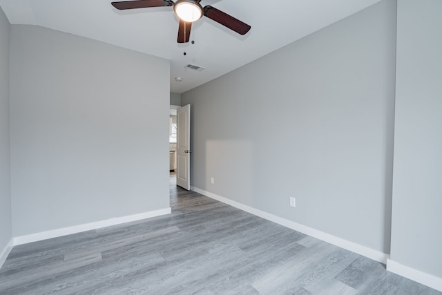 unfurnished room featuring light hardwood / wood-style flooring and ceiling fan