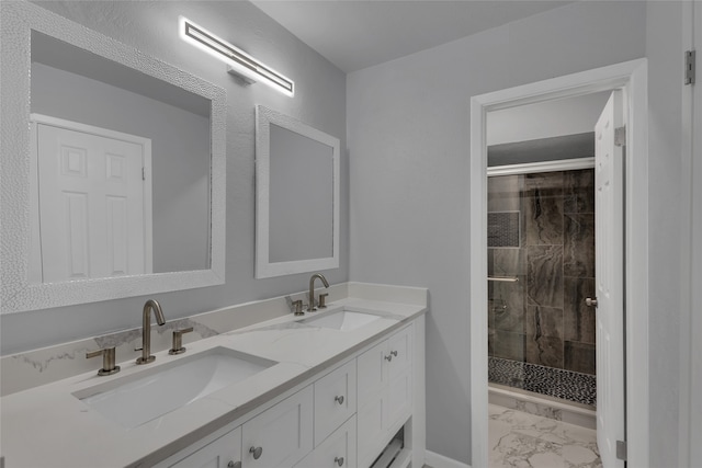 bathroom with an enclosed shower and vanity