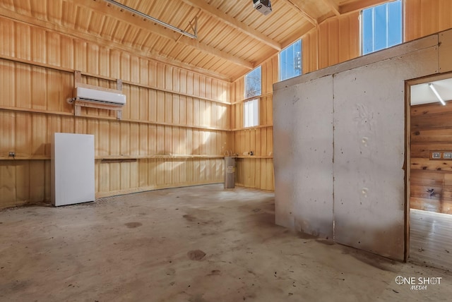 garage featuring a wall mounted AC and wooden walls