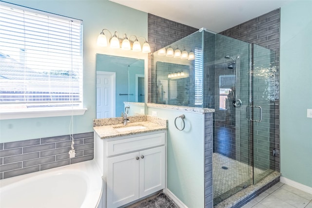 bathroom with tile patterned floors, vanity, and plus walk in shower