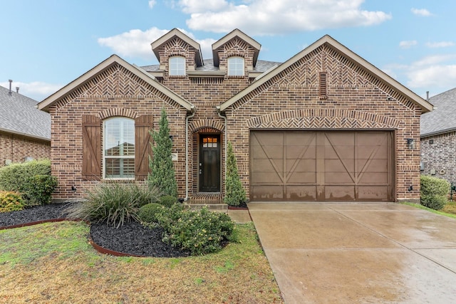 view of front of property with a garage