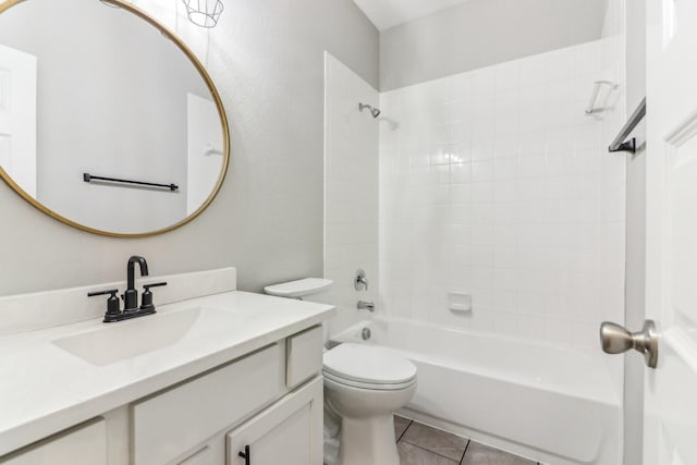 full bathroom with tile patterned flooring, vanity, toilet, and tiled shower / bath