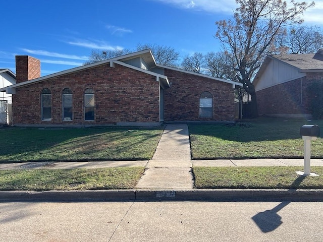 view of home's exterior featuring a lawn