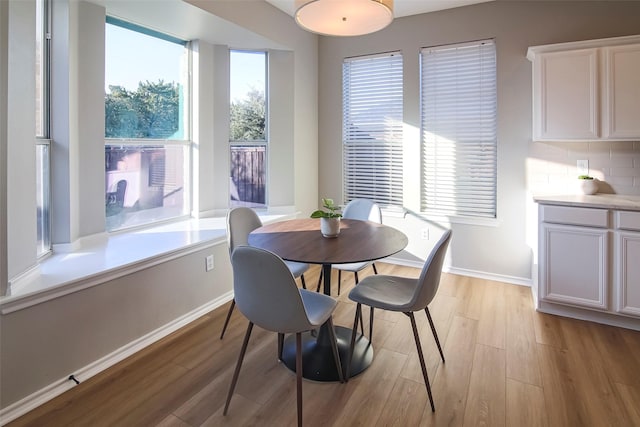 dining room with light hardwood / wood-style floors