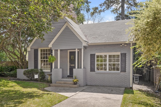 view of front of property with a front lawn