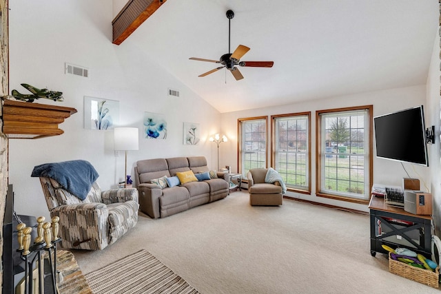 living room featuring carpet flooring, ceiling fan, beamed ceiling, and high vaulted ceiling