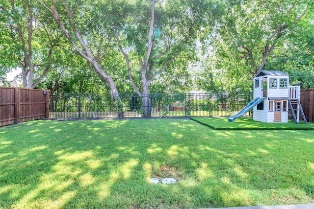 view of yard with a playground