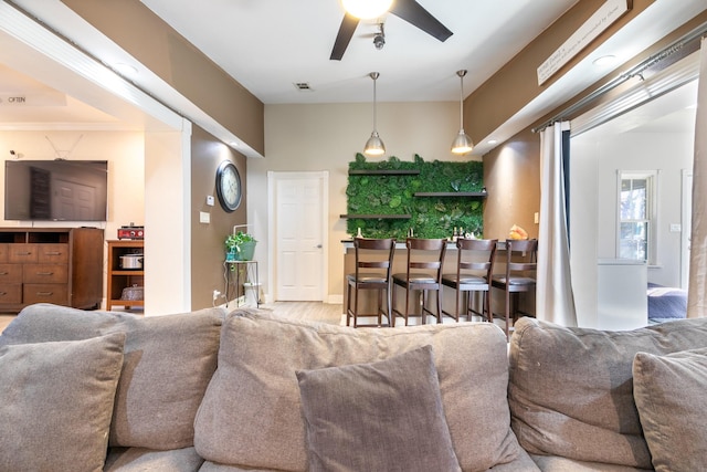 living room featuring ceiling fan