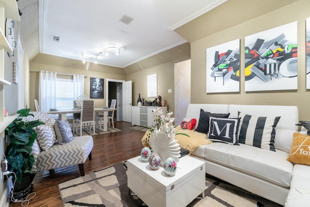 living room with dark wood-type flooring and ornamental molding