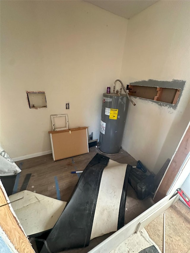 utility room with electric water heater