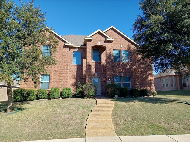 view of front of home featuring a front yard