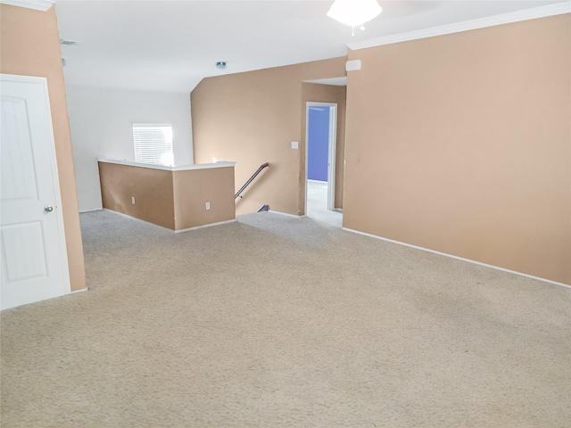 unfurnished room with light carpet and ornamental molding