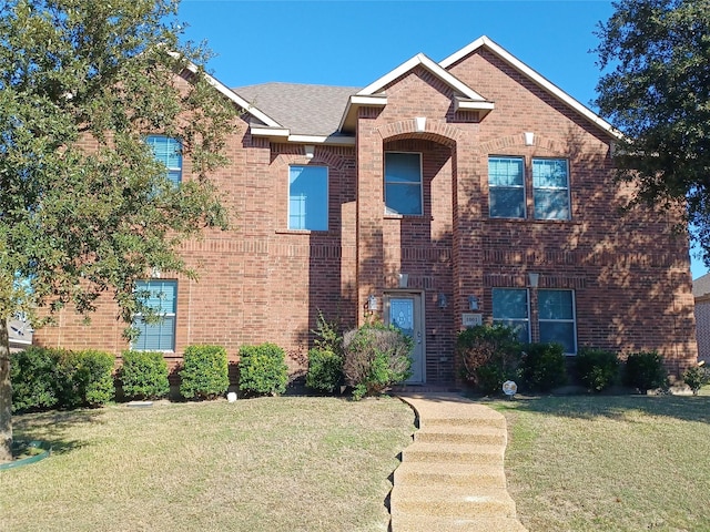 view of front of property featuring a front yard