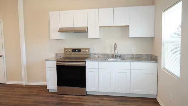 kitchen featuring sink, electric range, dark hardwood / wood-style floors, light stone counters, and white cabinets