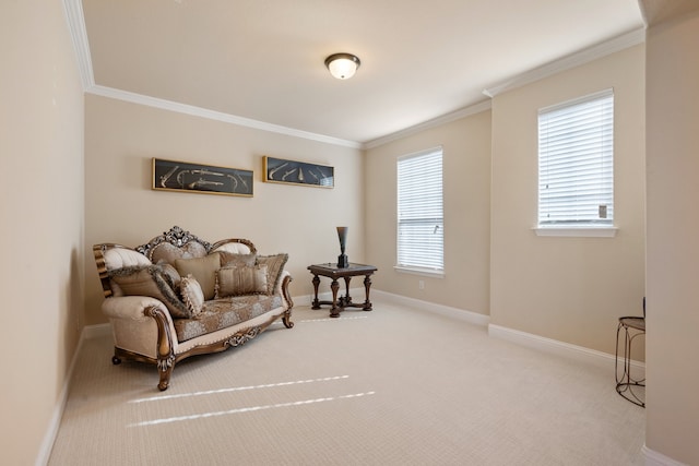 sitting room with crown molding and light carpet