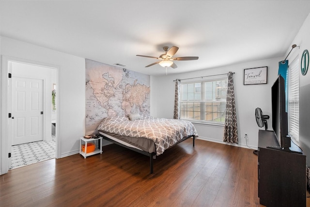 bedroom featuring dark wood-type flooring and ceiling fan