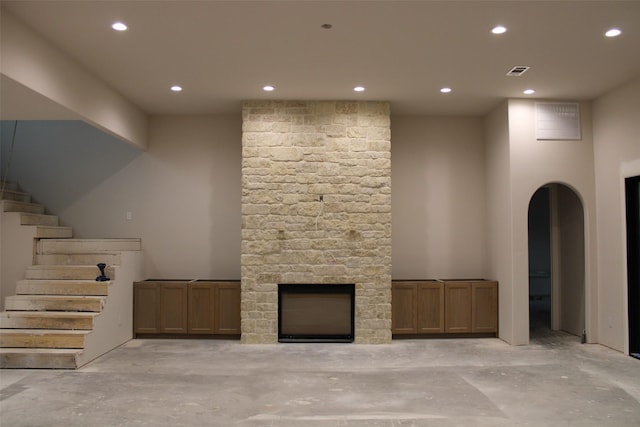 unfurnished living room with a fireplace