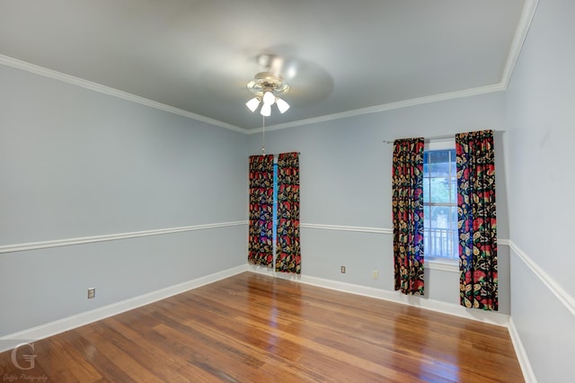 unfurnished room with wood-type flooring, ceiling fan, and ornamental molding