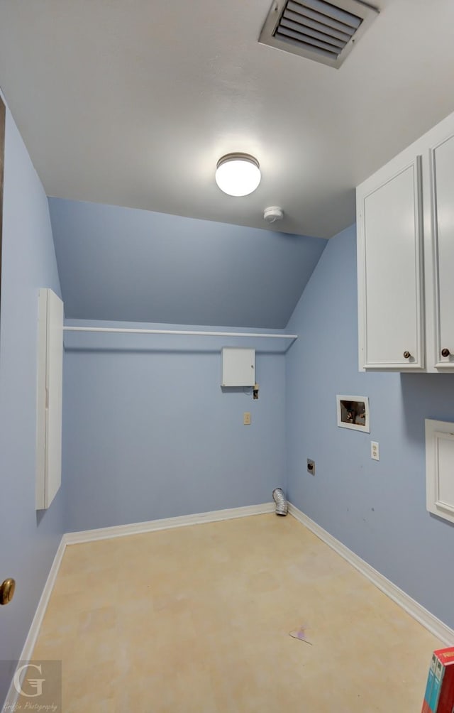 washroom with cabinets, washer hookup, and hookup for an electric dryer