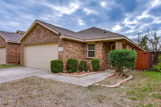 single story home with a garage