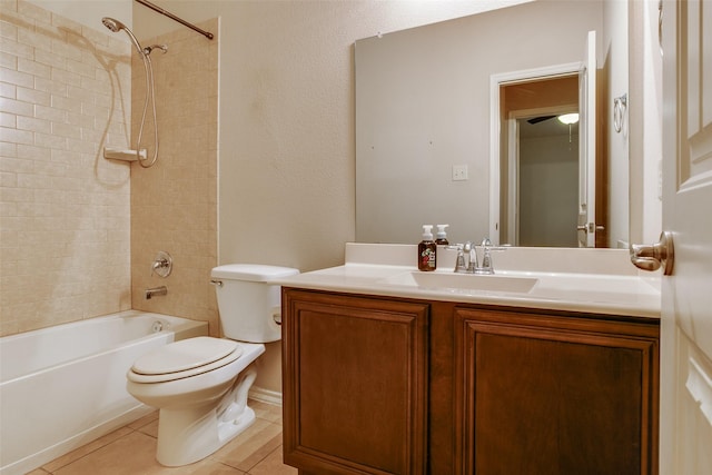 full bathroom with tile patterned floors, vanity, toilet, and tiled shower / bath combo