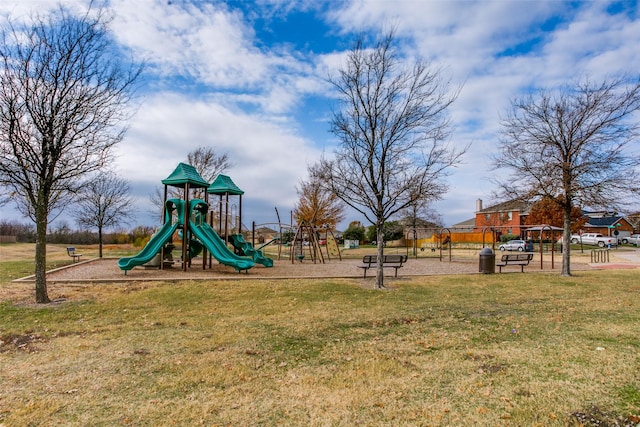 view of jungle gym with a lawn