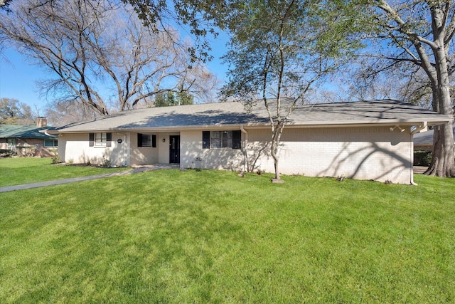 ranch-style house with a front yard