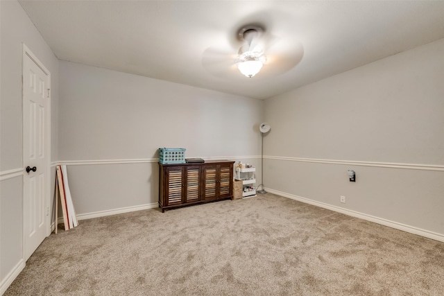 interior space featuring ceiling fan