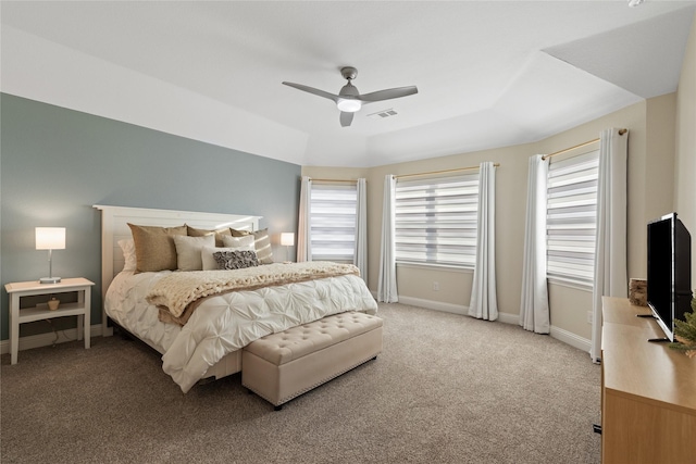 bedroom featuring visible vents, ceiling fan, light carpet, and baseboards