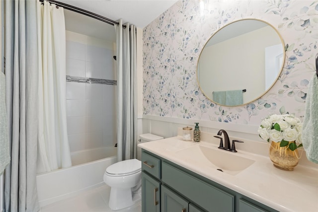 full bathroom with vanity, shower / bath combination with curtain, toilet, a wainscoted wall, and wallpapered walls