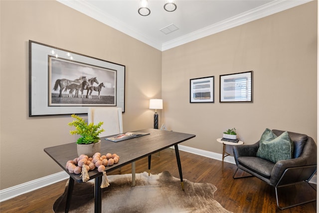office featuring ornamental molding, wood finished floors, and baseboards