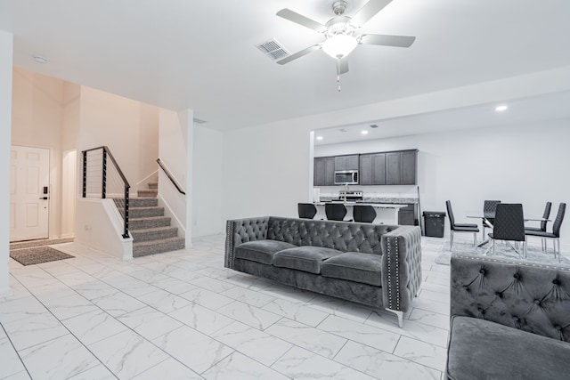 living room with ceiling fan