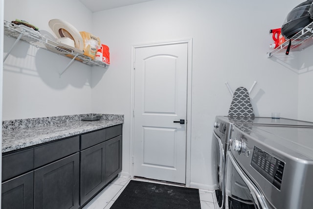 clothes washing area featuring washing machine and clothes dryer