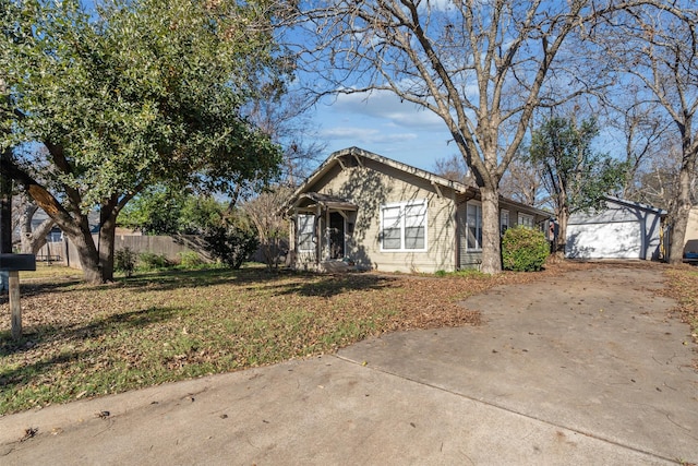 view of front of house featuring an outbuilding and a garage