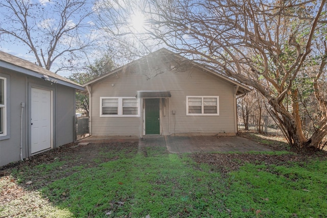 rear view of property featuring a patio