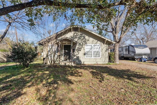 bungalow with a front lawn