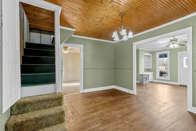 interior space with an inviting chandelier, built in features, crown molding, wood ceiling, and hardwood / wood-style flooring