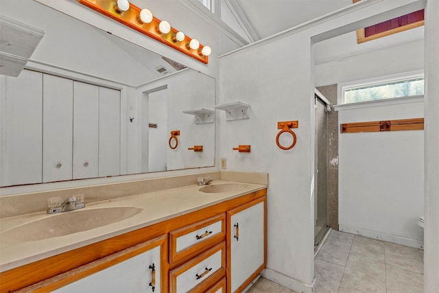 bathroom featuring tile patterned floors, vanity, a shower, toilet, and lofted ceiling