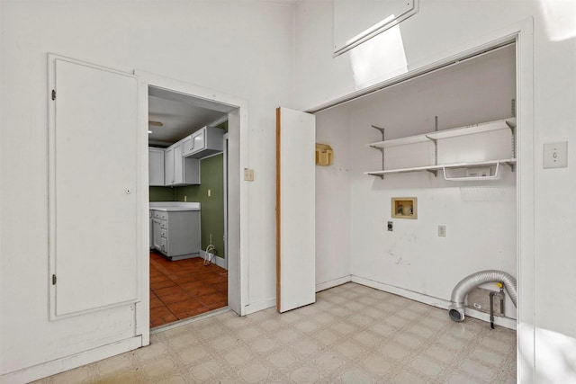 laundry room featuring hookup for a washing machine and hookup for an electric dryer