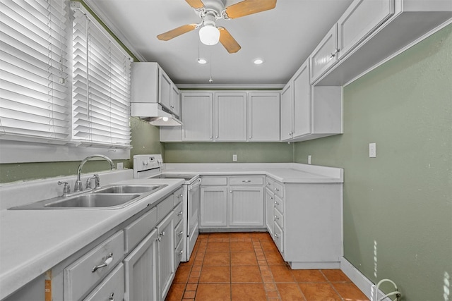 kitchen featuring white cabinets, sink, electric range, ceiling fan, and light tile patterned floors