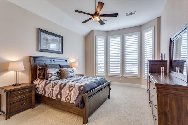 carpeted bedroom with lofted ceiling and ceiling fan