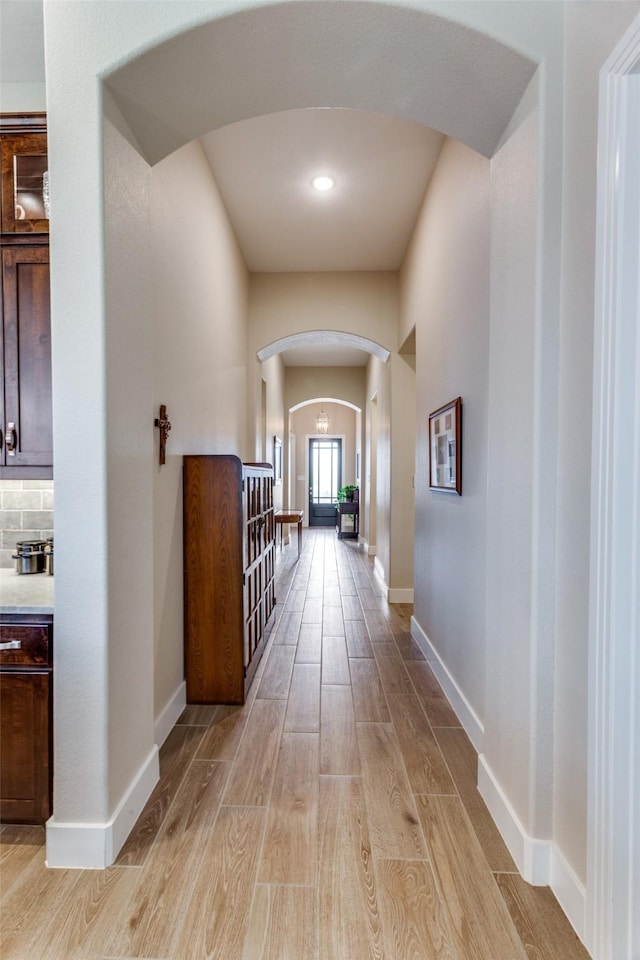 corridor featuring light wood-type flooring