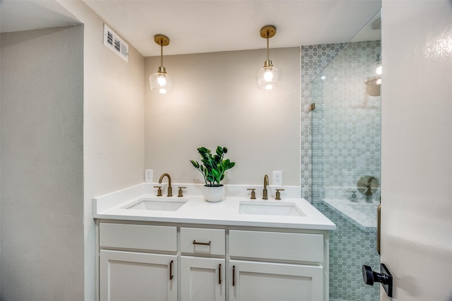 bathroom featuring vanity and walk in shower