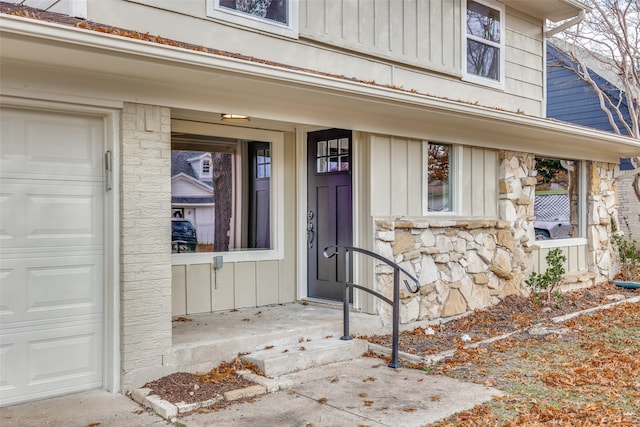 property entrance with a garage