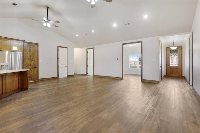 unfurnished living room featuring high vaulted ceiling, wood finished floors, visible vents, a ceiling fan, and baseboards